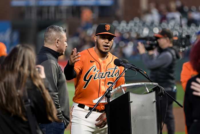 SF Giants second baseman Thairo Estrada (39) addresses the crowd after winning the WIllie Mac award before the game against the Los Angeles Dodgers at Oracle Park.